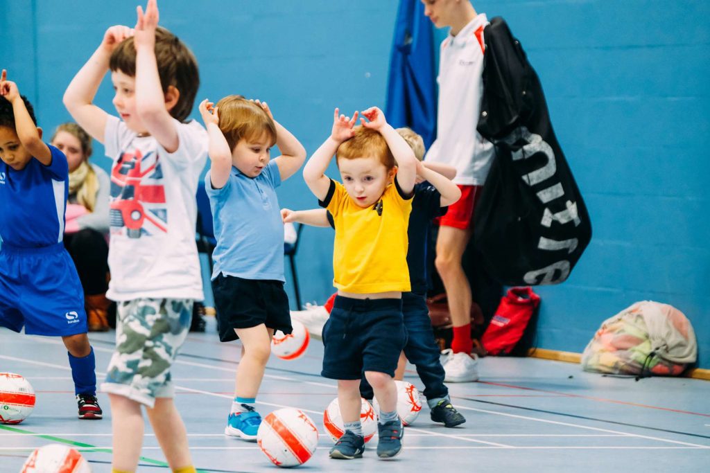 Children enjoying a Kick-A-Bout football birthday party